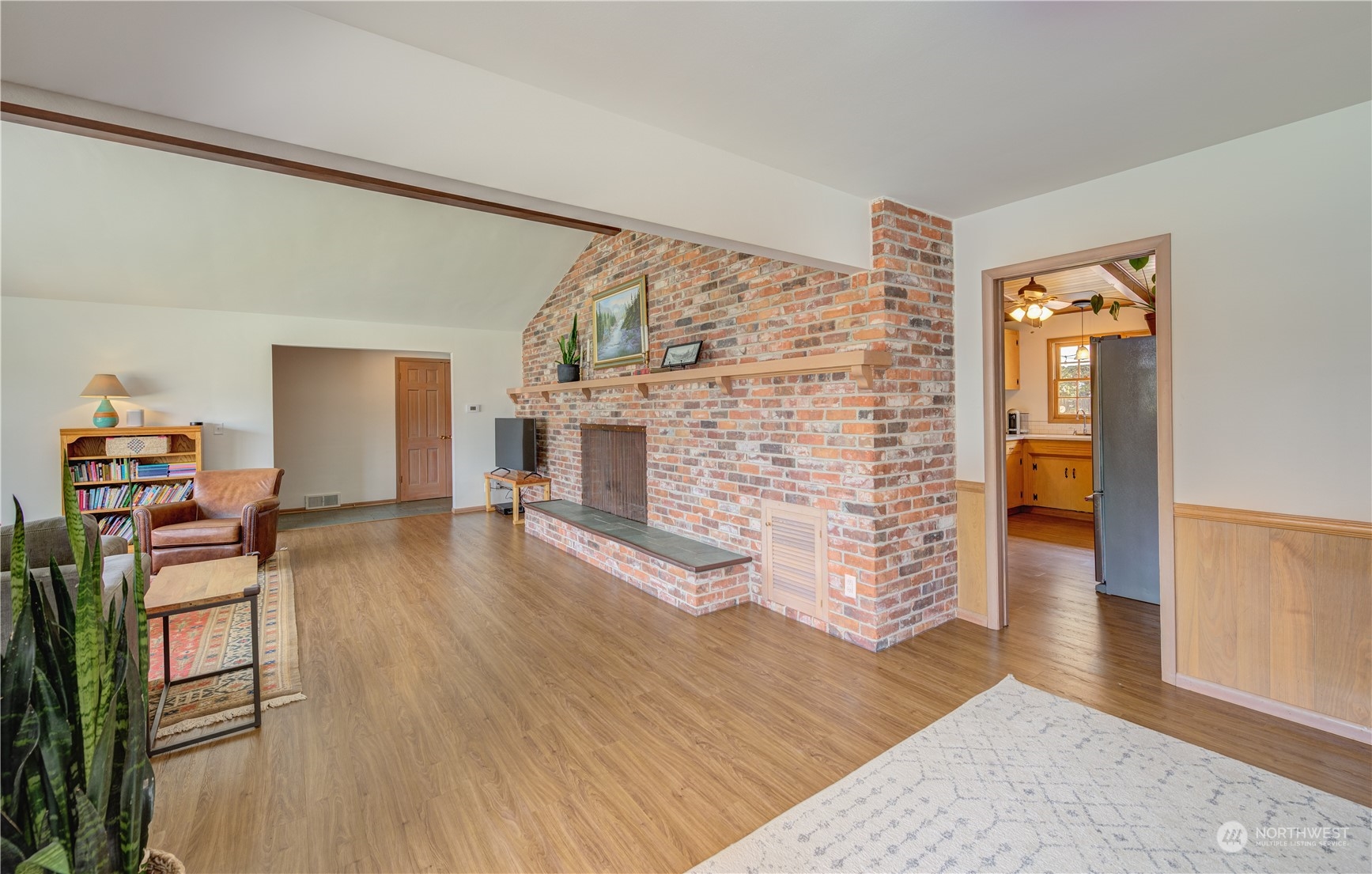 1405 First Street Wenatchee, WA 98801 - Photo 15 of 40 a living room with furniture and a fireplace