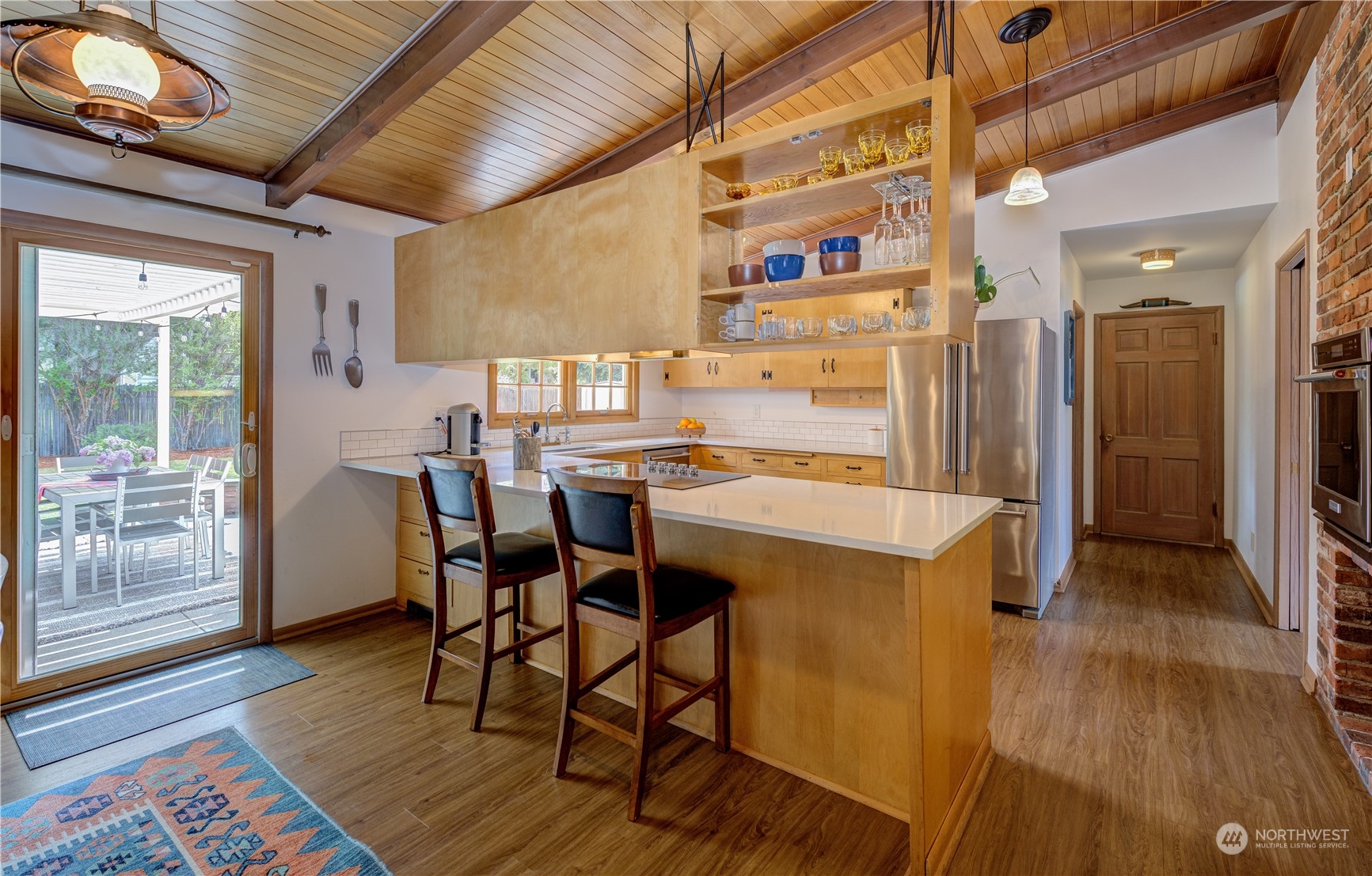 1405 First Street Wenatchee, WA 98801 - Photo 16 of 40 a dining room with furniture and wooden floor