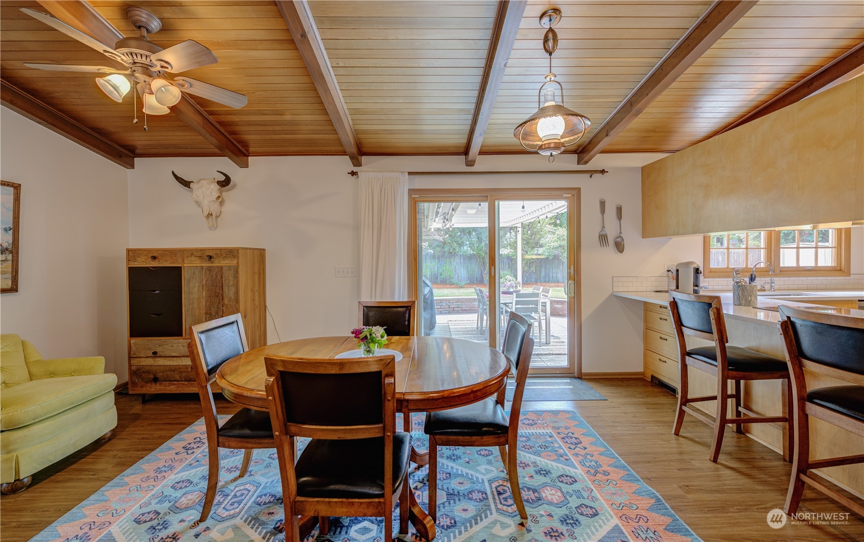 1405 First Street Wenatchee, WA 98801 - Photo 17 of 40 a dining room with furniture a chandelier and wooden floor