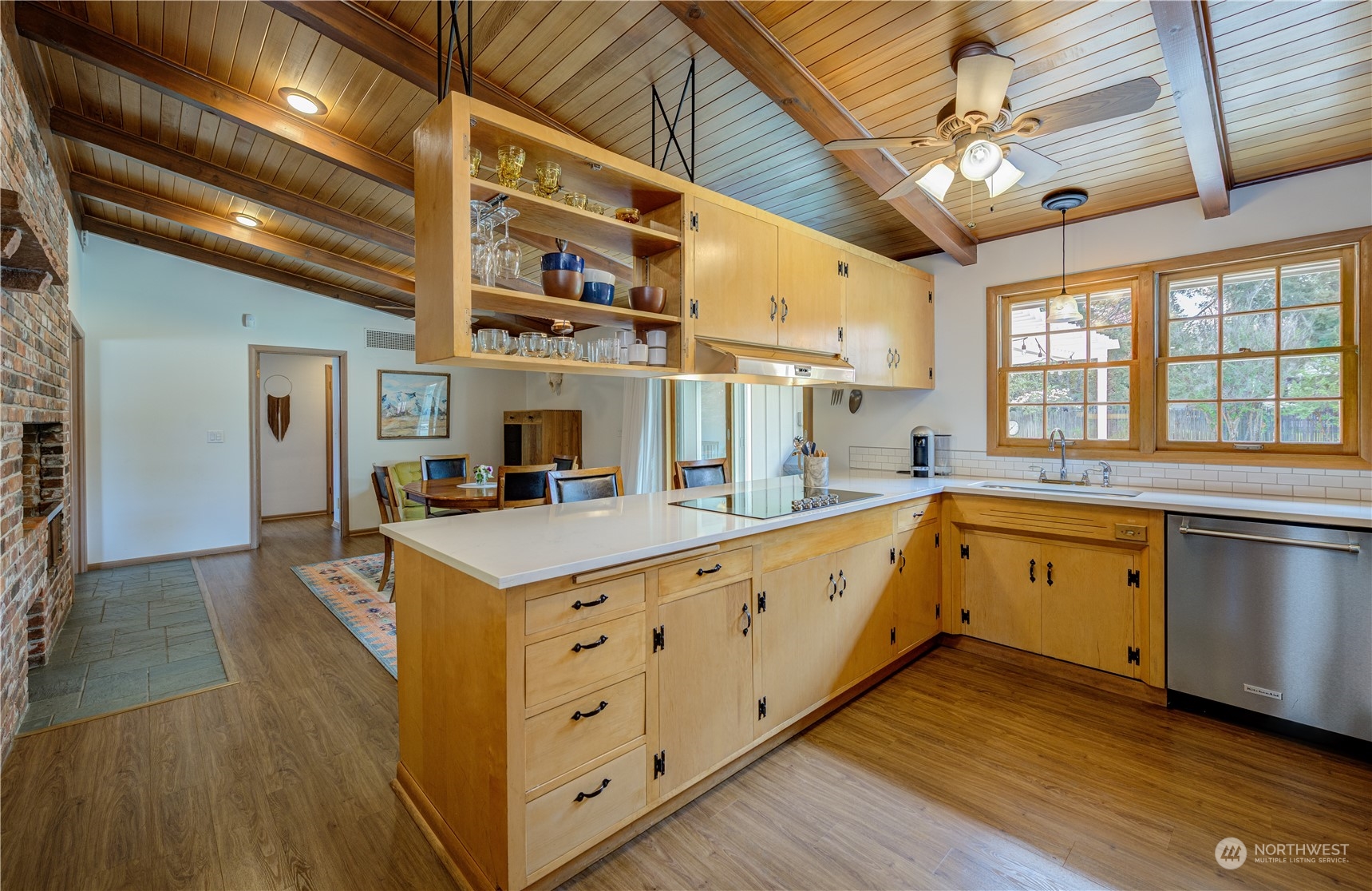 1405 First Street Wenatchee, WA 98801 - Photo 23 of 40 a large kitchen with stainless steel appliances granite countertop a stove and a sink