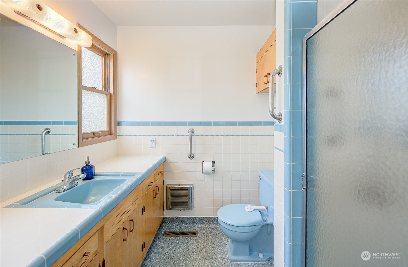 1405 First Street Wenatchee, WA 98801 - Photo 33 of 40 a bathroom with a double vanity sink toilet and a mirror
