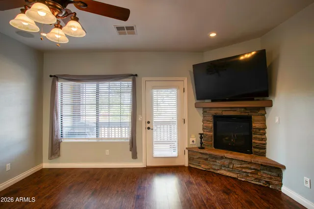 a kitchen with stainless steel appliances granite countertop a stove and a refrigerator