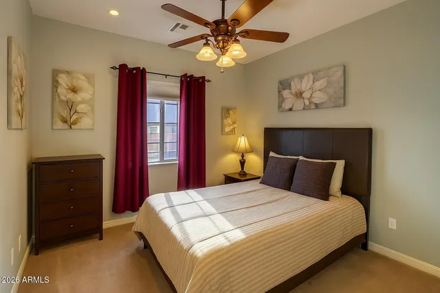 a view of a balcony with furniture