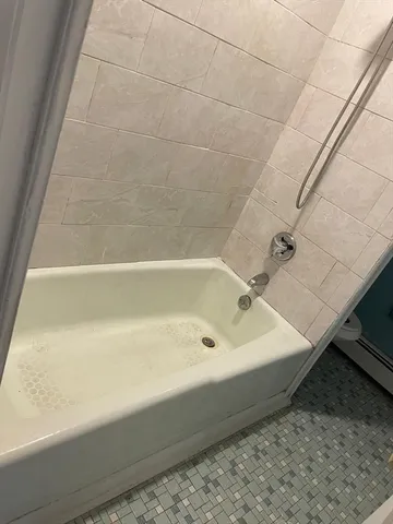 a bathroom with a bathtub