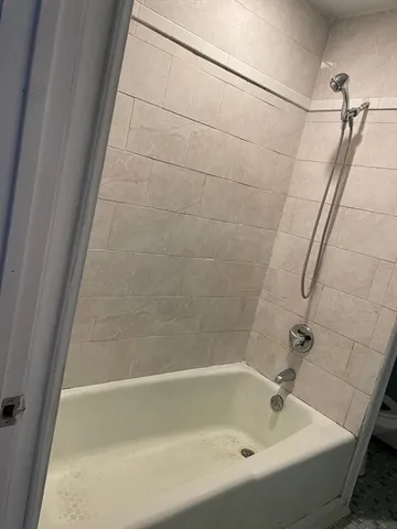 a bathroom with a bathtub