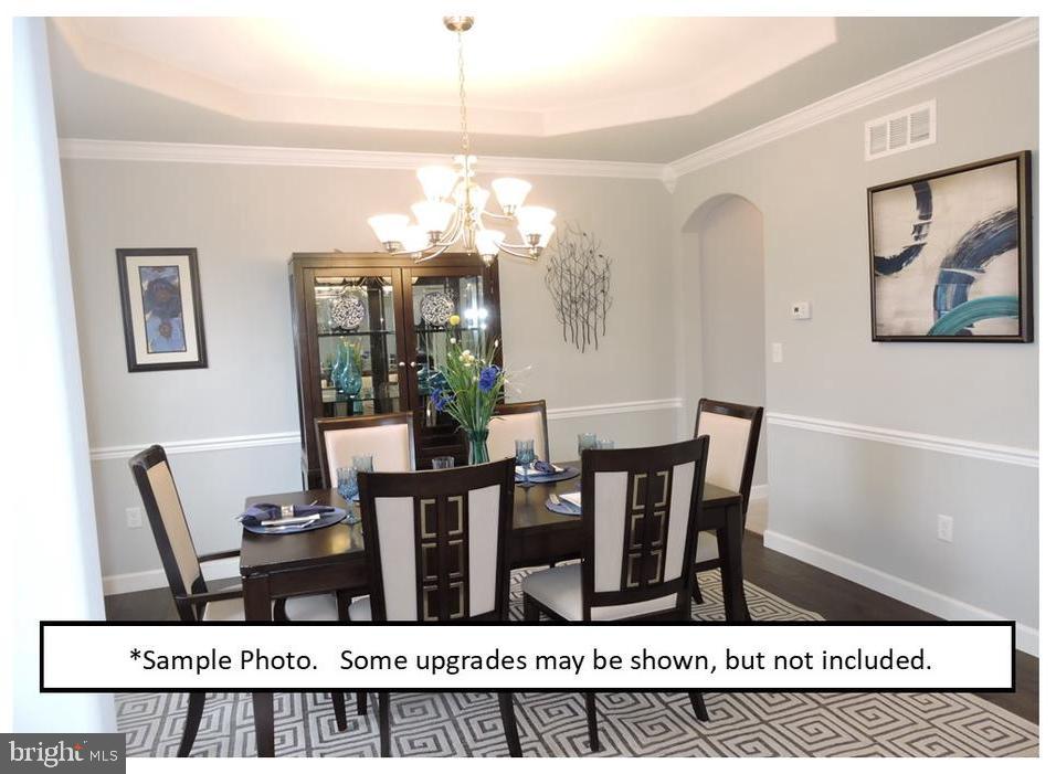 5205 Stoudts Ferry Bridge Road Reading, PA 19605 - Photo 17 of 27 a view of a dining room with furniture and chandelier