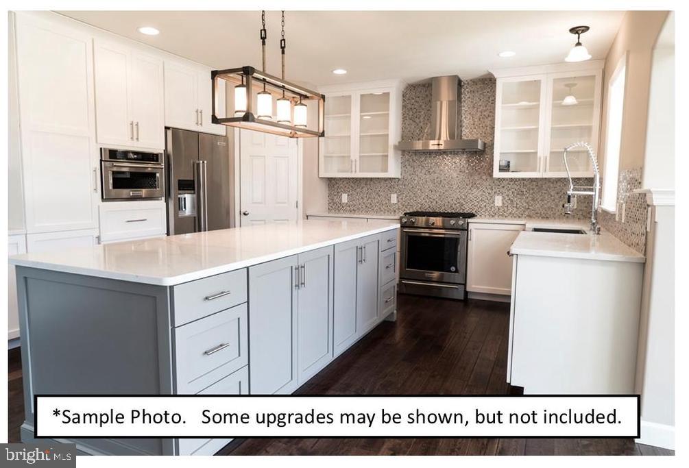 5205 Stoudts Ferry Bridge Road Reading, PA 19605 - Photo 19 of 27 a kitchen with a refrigerator and a sink