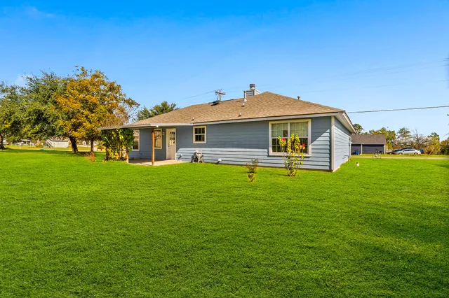 a front view of house with yard