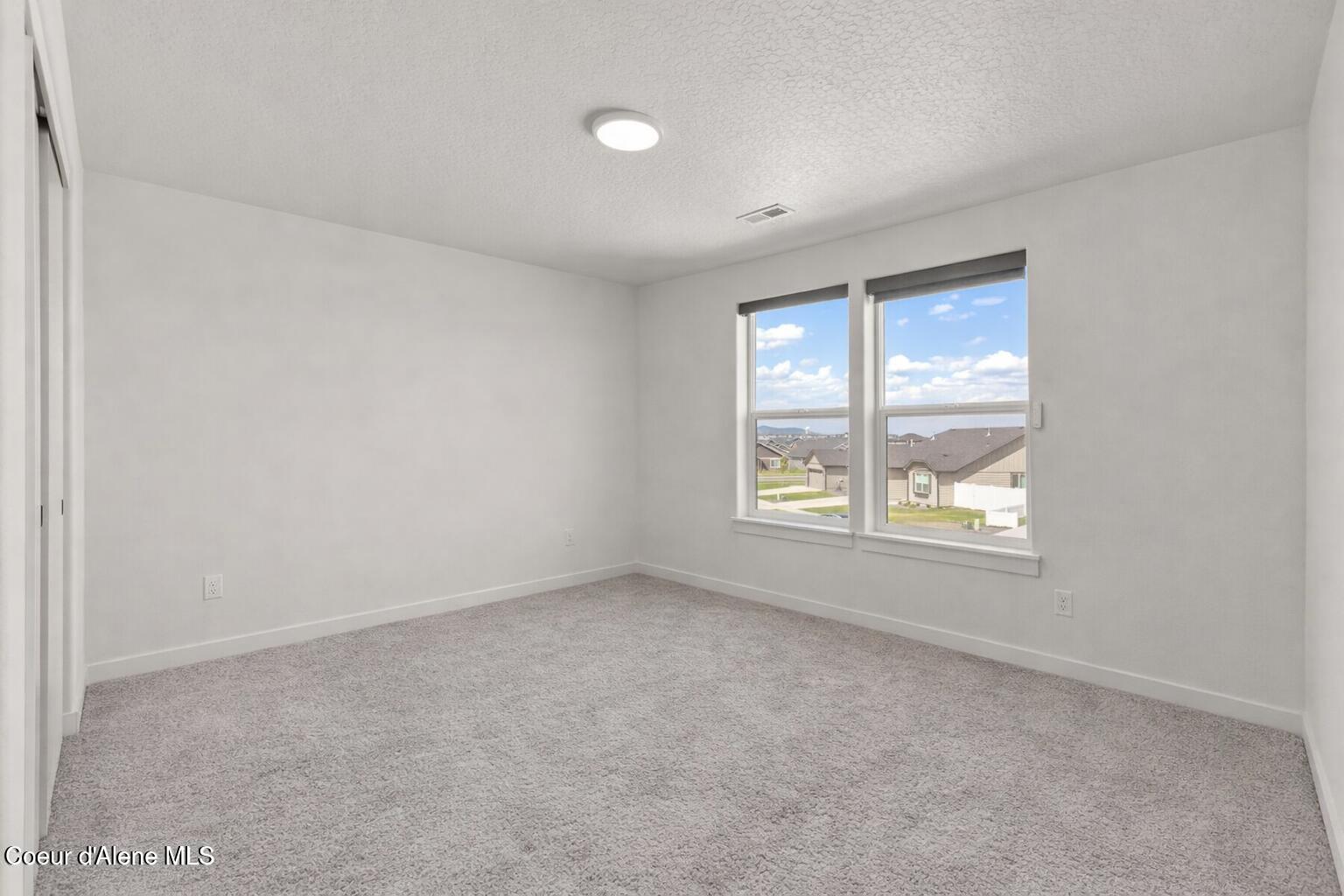 11781 North Banford Lane Rathdrum, ID 83858 - Photo 16 of 21 Stock Bedroom