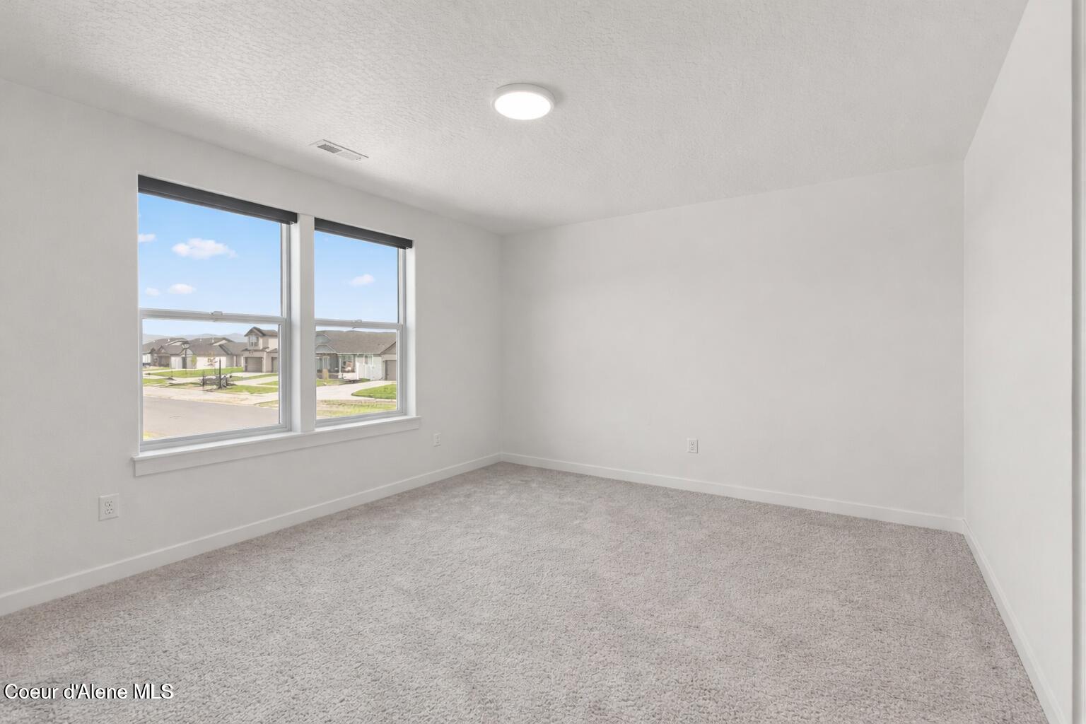 11781 North Banford Lane Rathdrum, ID 83858 - Photo 17 of 21 Stock Bedroom