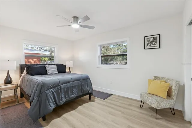 a view of an empty room with windows