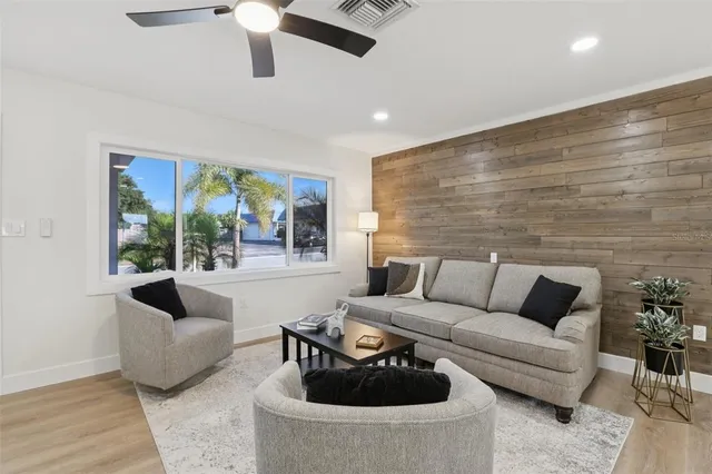 a bathroom with a sink vanity granite and a mirror