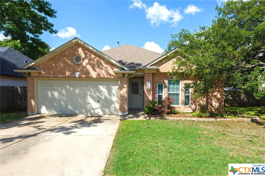 3504 Flora Vista Loop Round Rock, TX 78681 - Photo 1 of 1 a front view of a house with a yard