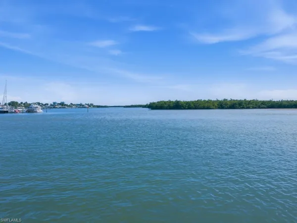 a view of outside space and a lake view