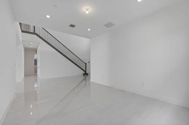 a bathroom with a shower and a sink