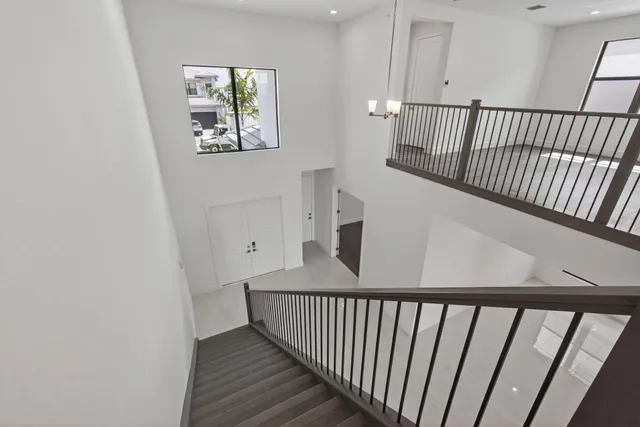 a bathroom with a toilet and a bathtub