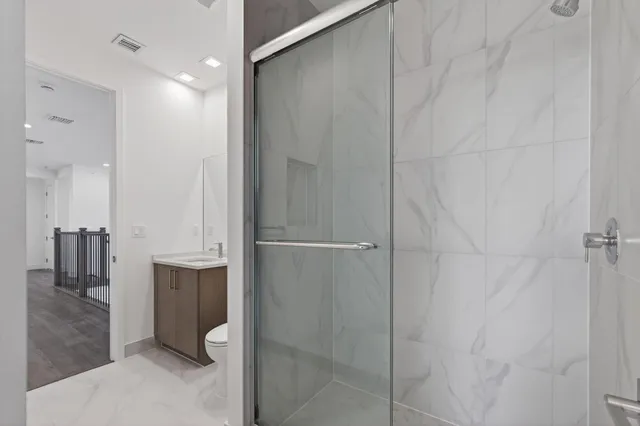 an aerial view of a house with a garden