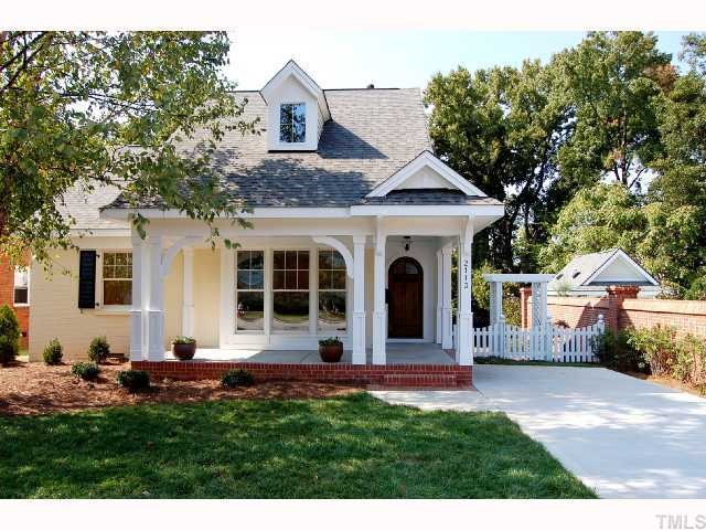 2113 Noble Road Raleigh, NC 27608 - Photo 1 of 11 a front view of a house with a garden