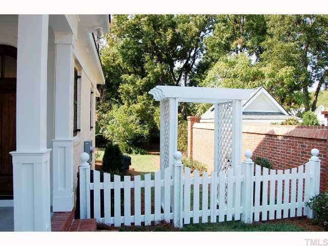 2113 Noble Road Raleigh, NC 27608 - Photo 10 of 11 a view of a wooden fence and two chairs
