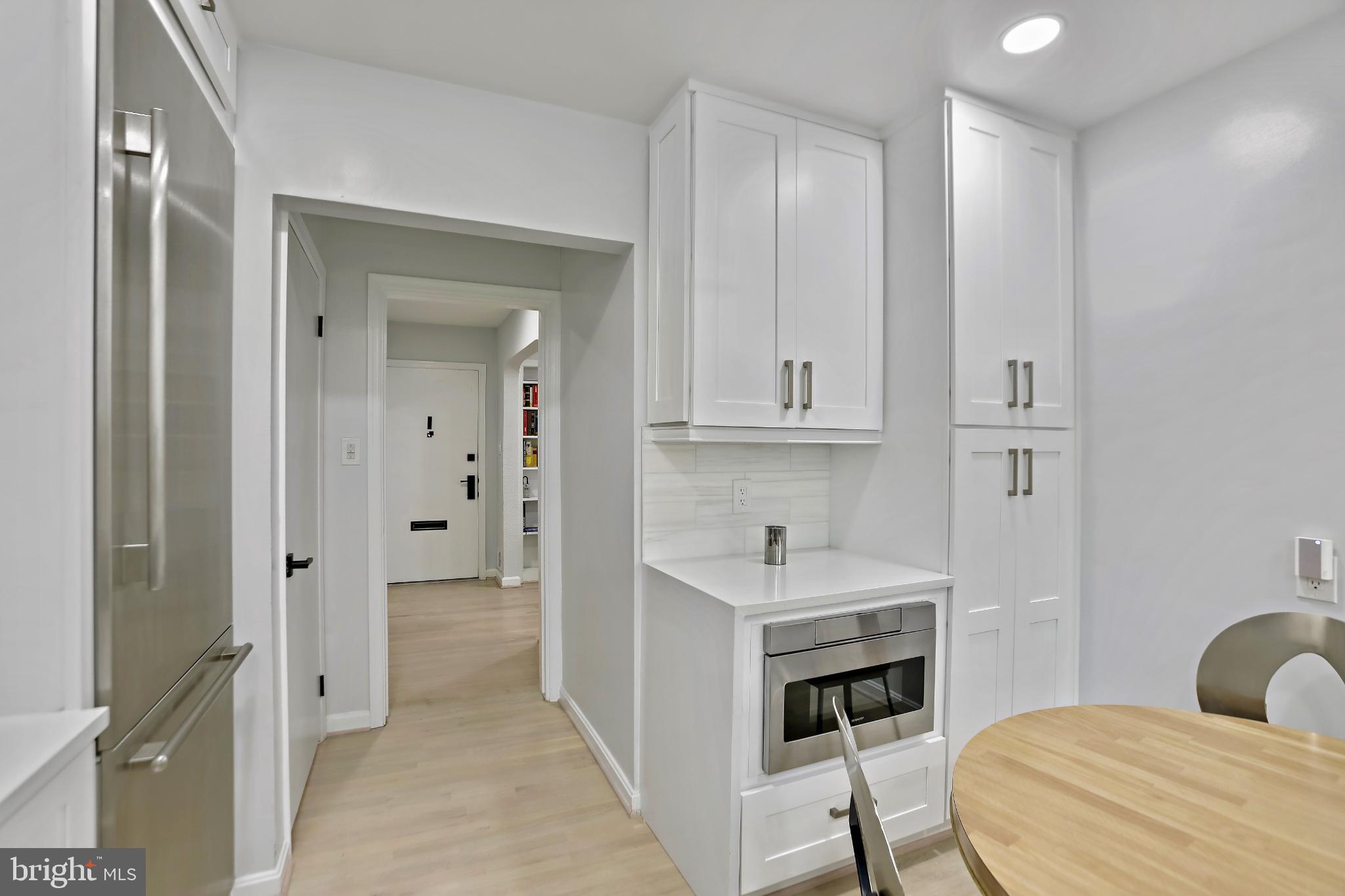 3906 Ridge Road Annandale, VA 22003 - Photo 11 of 34 a bathroom with a sink and a mirror