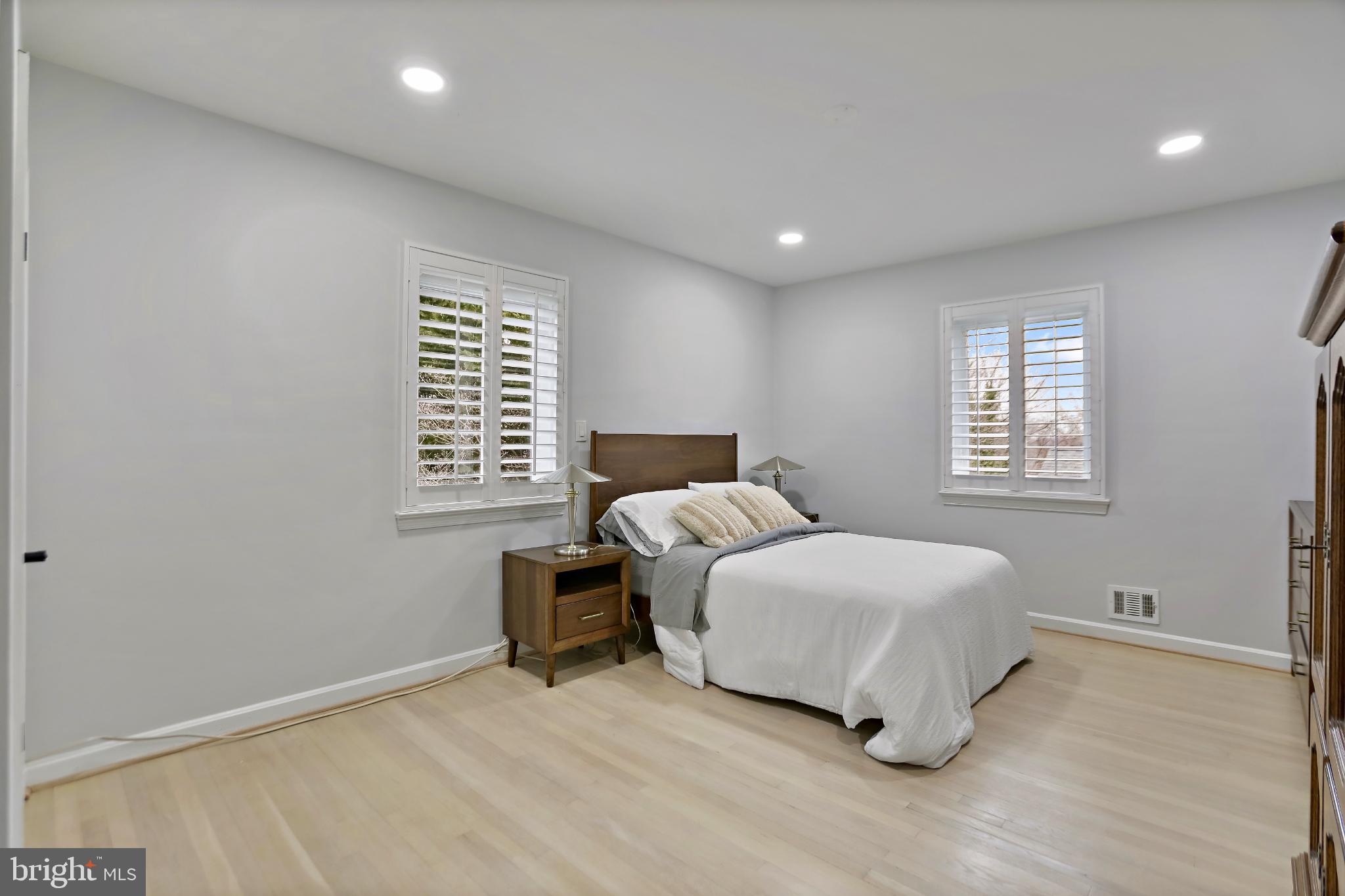 3906 Ridge Road Annandale, VA 22003 - Photo 17 of 34 a bedroom with a bed and a window