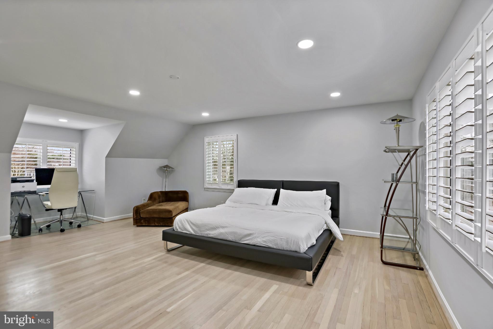 3906 Ridge Road Annandale, VA 22003 - Photo 28 of 34 a bedroom with furniture and a wooden floor