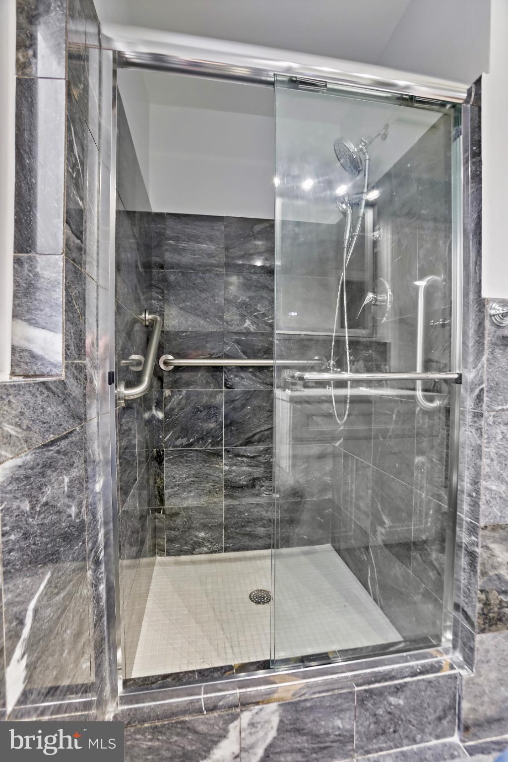 3906 Ridge Road Annandale, VA 22003 - Photo 30 of 34 a bathroom with a shower