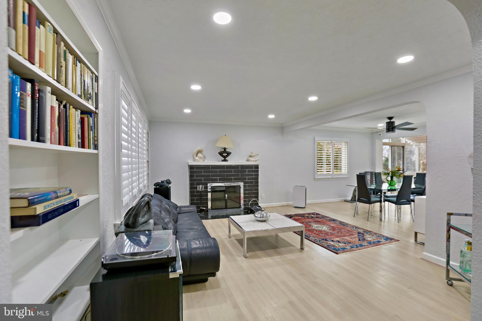 3906 Ridge Road Annandale, VA 22003 - Photo 7 of 34 a living room with furniture fireplace and rug