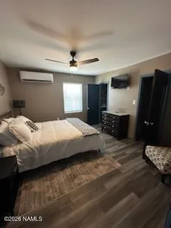 a bedroom with a bed and a mirror