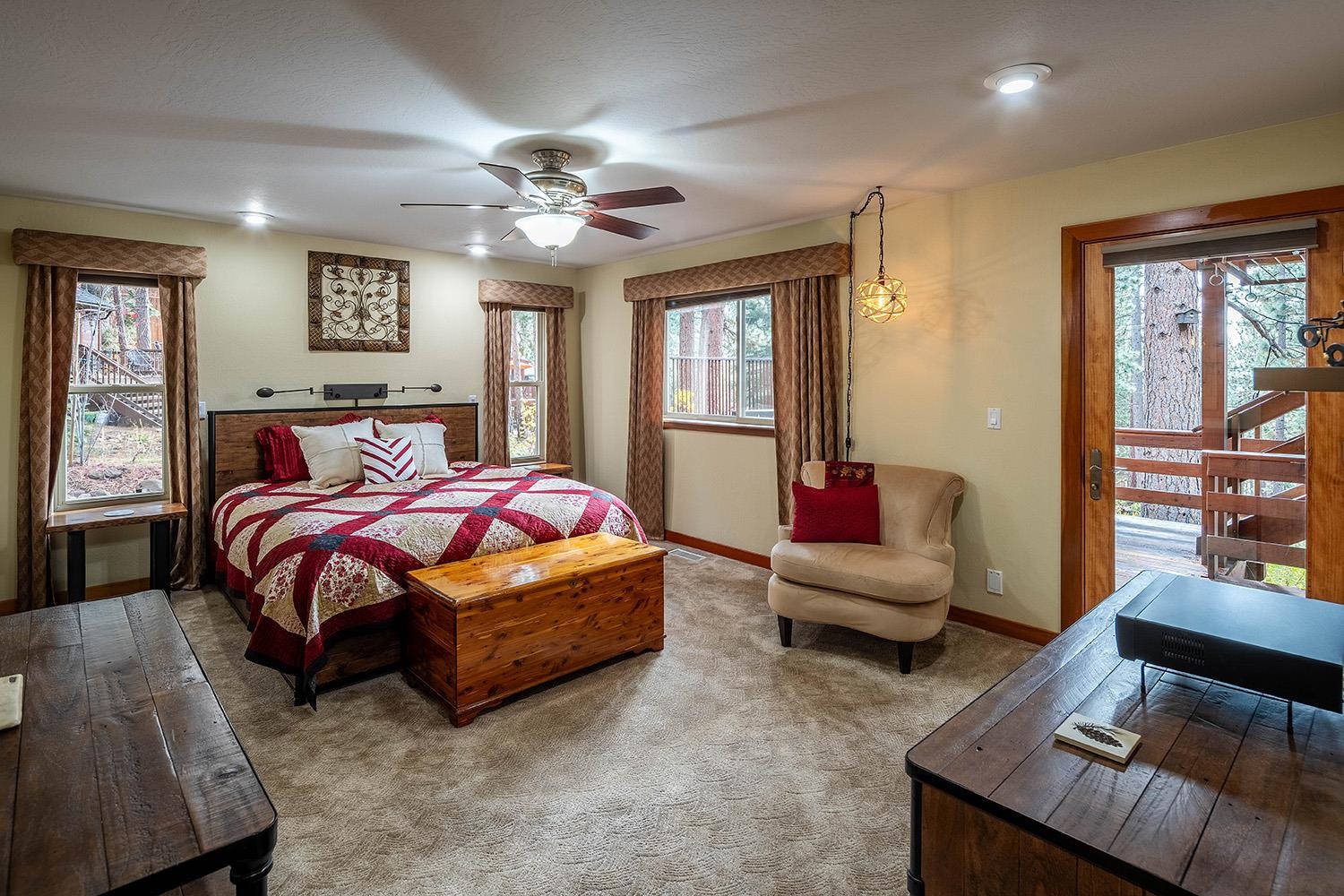 12095 Rainbow Drive Truckee, CA 96161 - Photo 11 of 21 a bedroom with a bed couch and window