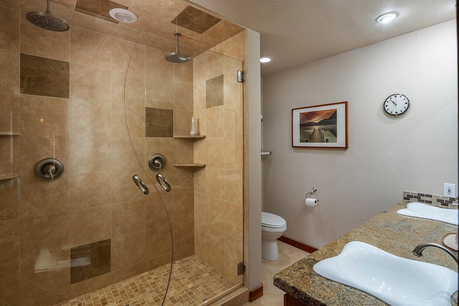 12095 Rainbow Drive Truckee, CA 96161 - Photo 14 of 21 a bathroom with a granite countertop sink mirror vanity and toilet