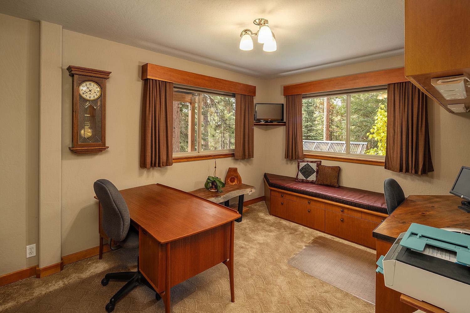 12095 Rainbow Drive Truckee, CA 96161 - Photo 17 of 21 a living room with furniture and a window