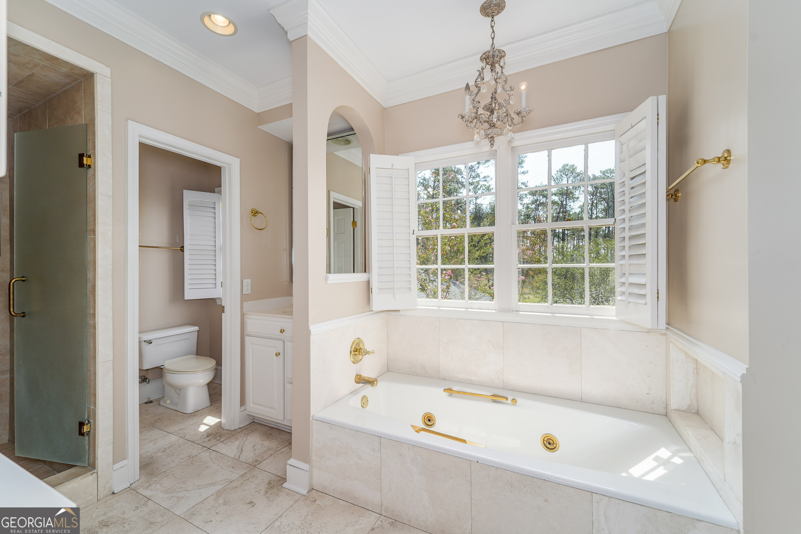 1602 Ward St Extension West Douglas, GA 31533 - Photo 56 of 70 a bathroom with a tub a toilet and a window