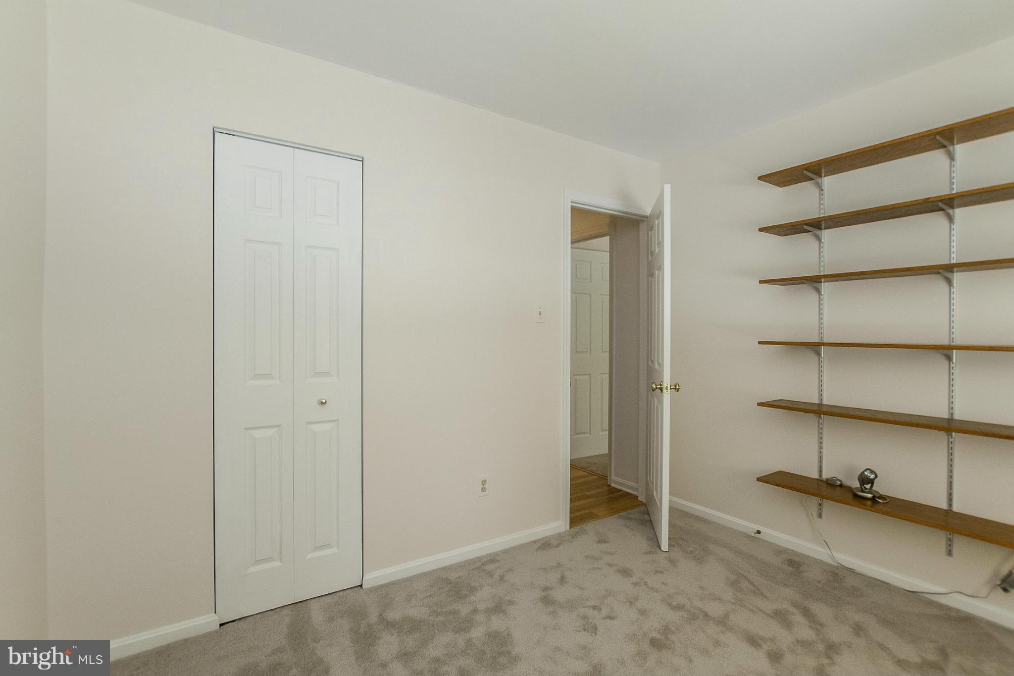 9338 Oak White Road Baltimore, MD 21236 - Photo 15 of 27 a view of room with walk in closet