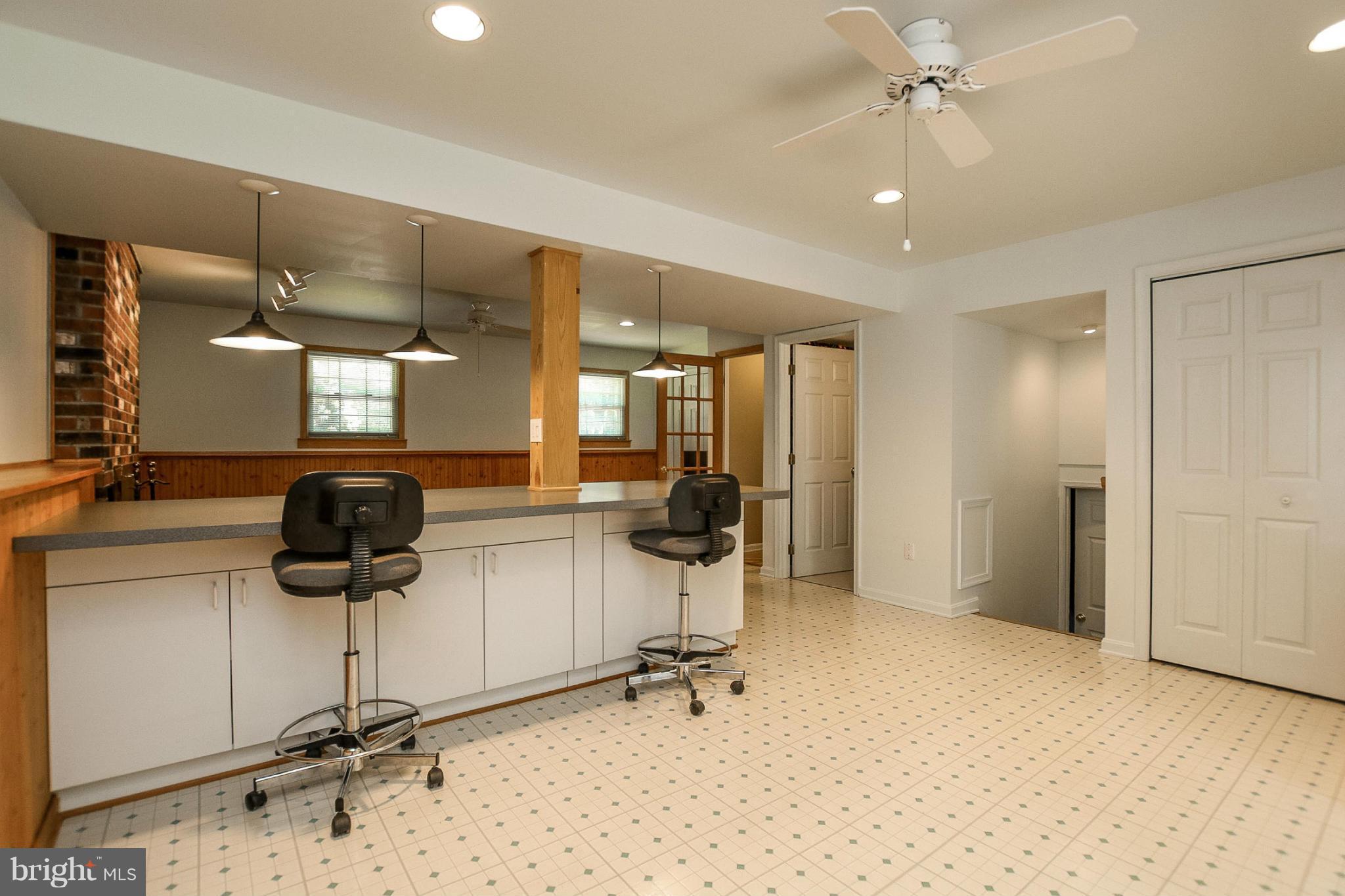 9338 Oak White Road Baltimore, MD 21236 - Photo 20 of 27 a view of a hallway with workspace