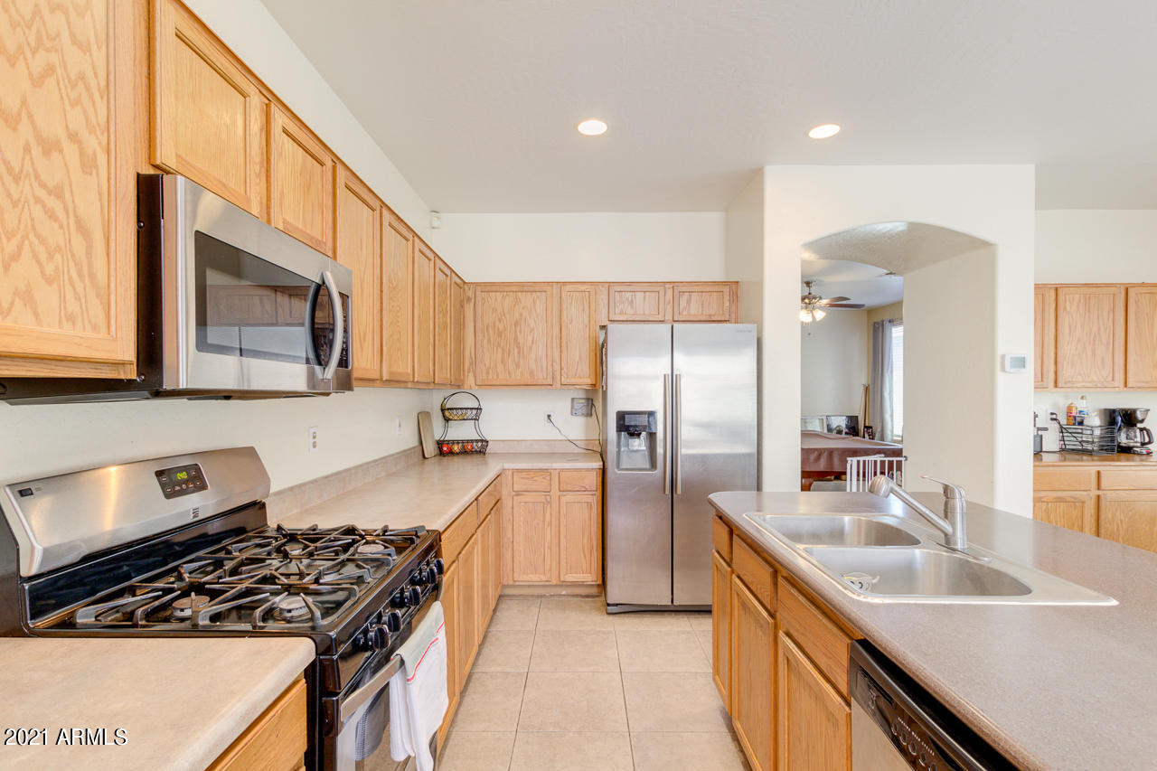 10126 West Cordes Road Tolleson, AZ 85353 - Photo 20 of 39 Great Spacing in Kitchen