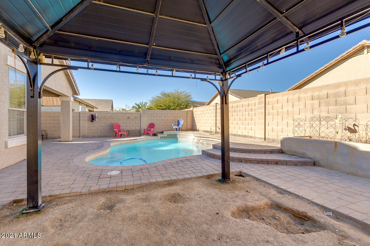 10126 West Cordes Road Tolleson, AZ 85353 - Photo 37 of 39 Poolside Fun