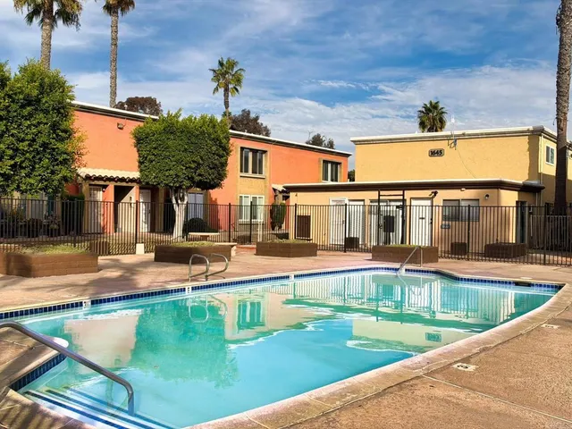 a view of a house with swimming pool