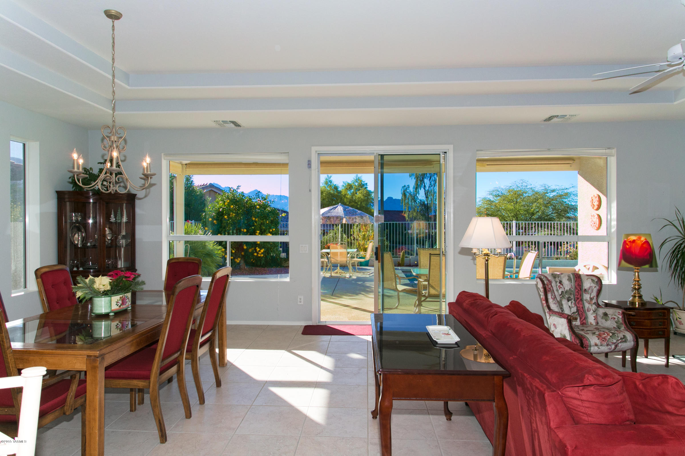62419 East Northwood Road Tucson, AZ 85739 - Photo 29 of 30 a view of a dining room with furniture window and outside view