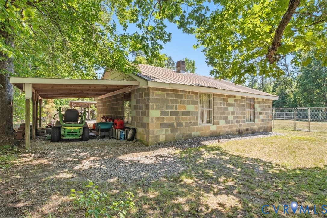 15503 Eppes Road Dewitt, VA 23840 - Photo 18 of 22 a view of a house with backyard and porch