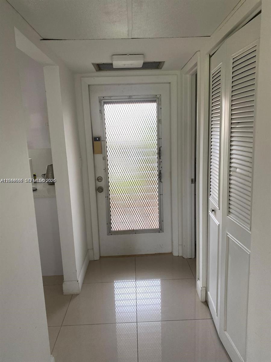 8838 West McNab Road, Unit 104 Tamarac, FL 33321 - Photo 15 of 23 a view of entrance door