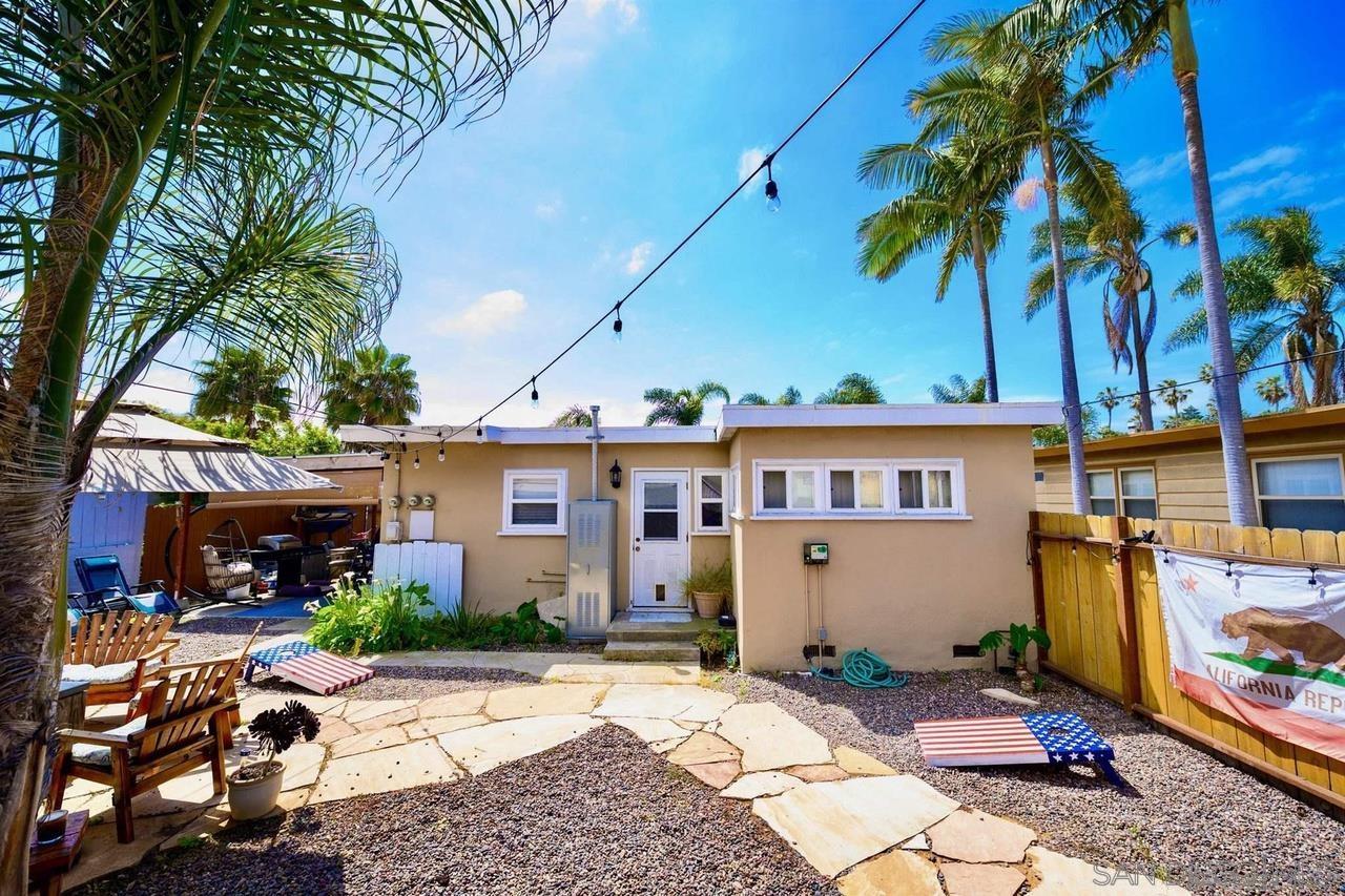 934 Reed Avenue San Diego, CA 92109 - Photo 13 of 39 a front view of a house with a garden