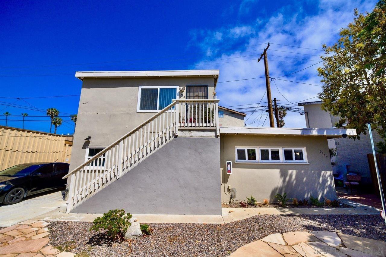 934 Reed Avenue San Diego, CA 92109 - Photo 14 of 39 a view of a house with a small yard