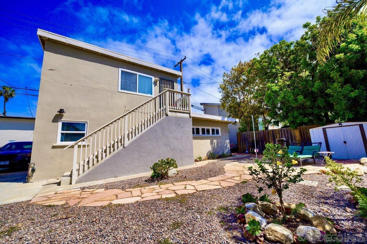 934 Reed Avenue San Diego, CA 92109 - Photo 16 of 39 a view of a house with a yard