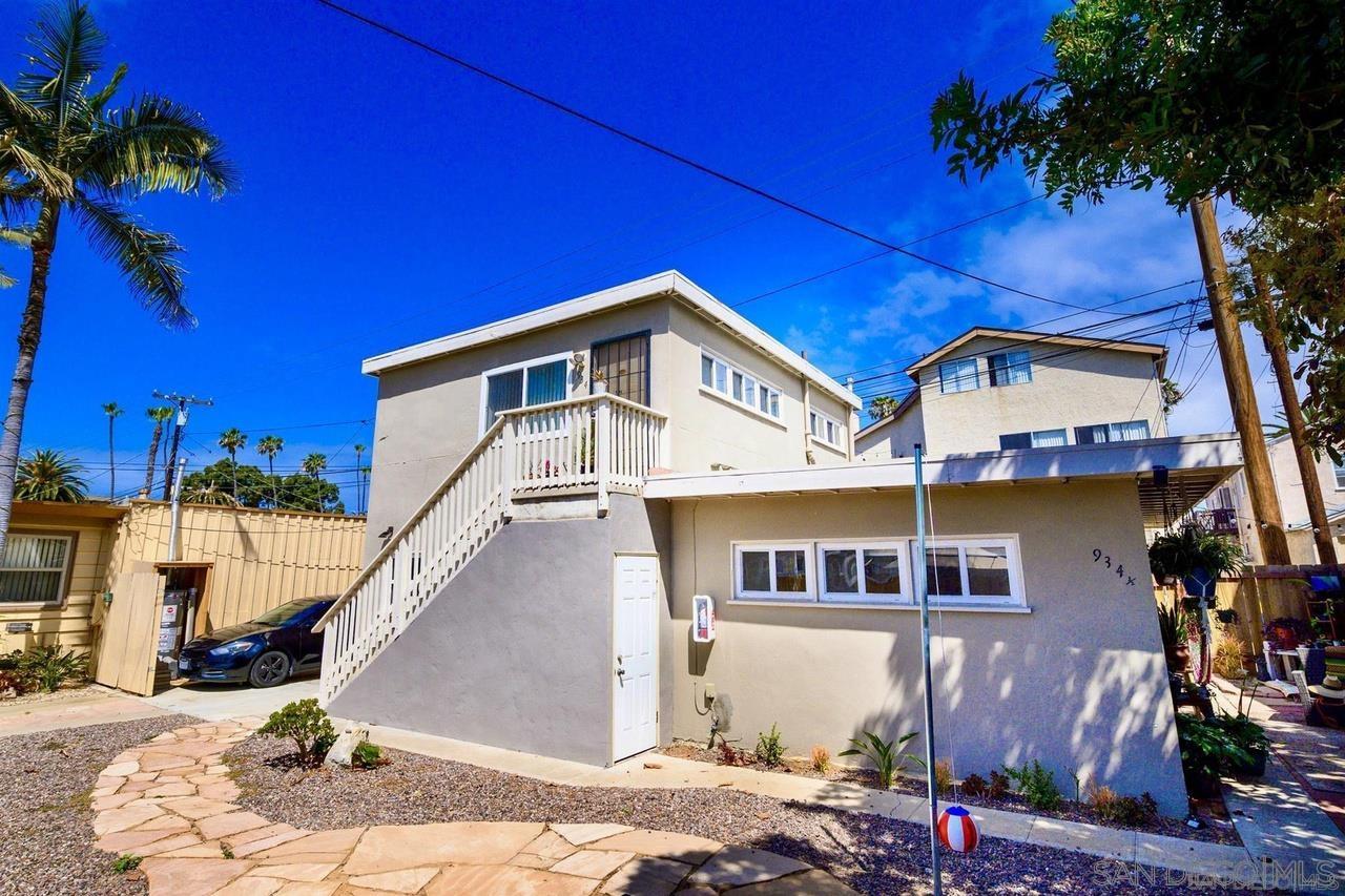 934 Reed Avenue San Diego, CA 92109 - Photo 27 of 39 a front view of a house with a yard