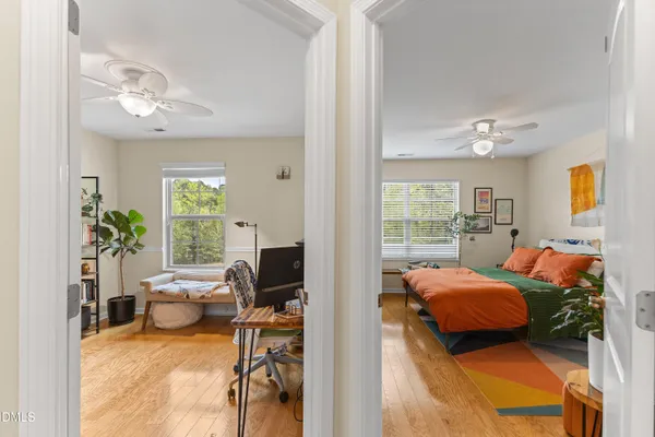 a bedroom with furniture and a window