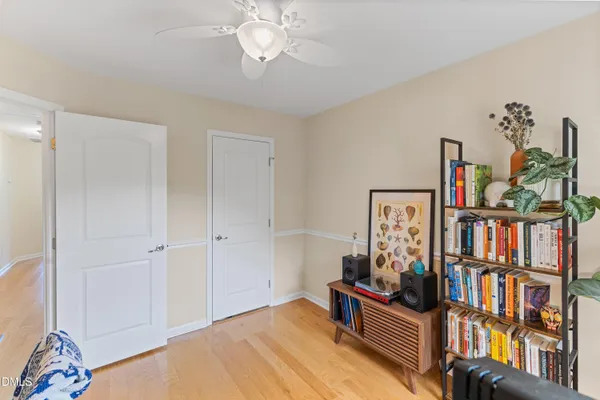 a view of a livingroom with furniture and workspace