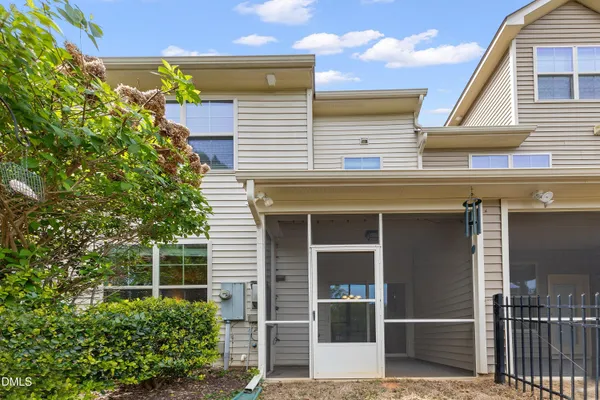 a front view of a house with garage