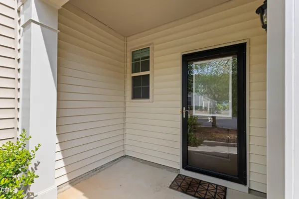a view of a door and a window