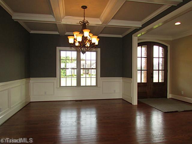 Dining Room. Stunning trim work abounds in the dining room and adds a bit of understated elegance.
